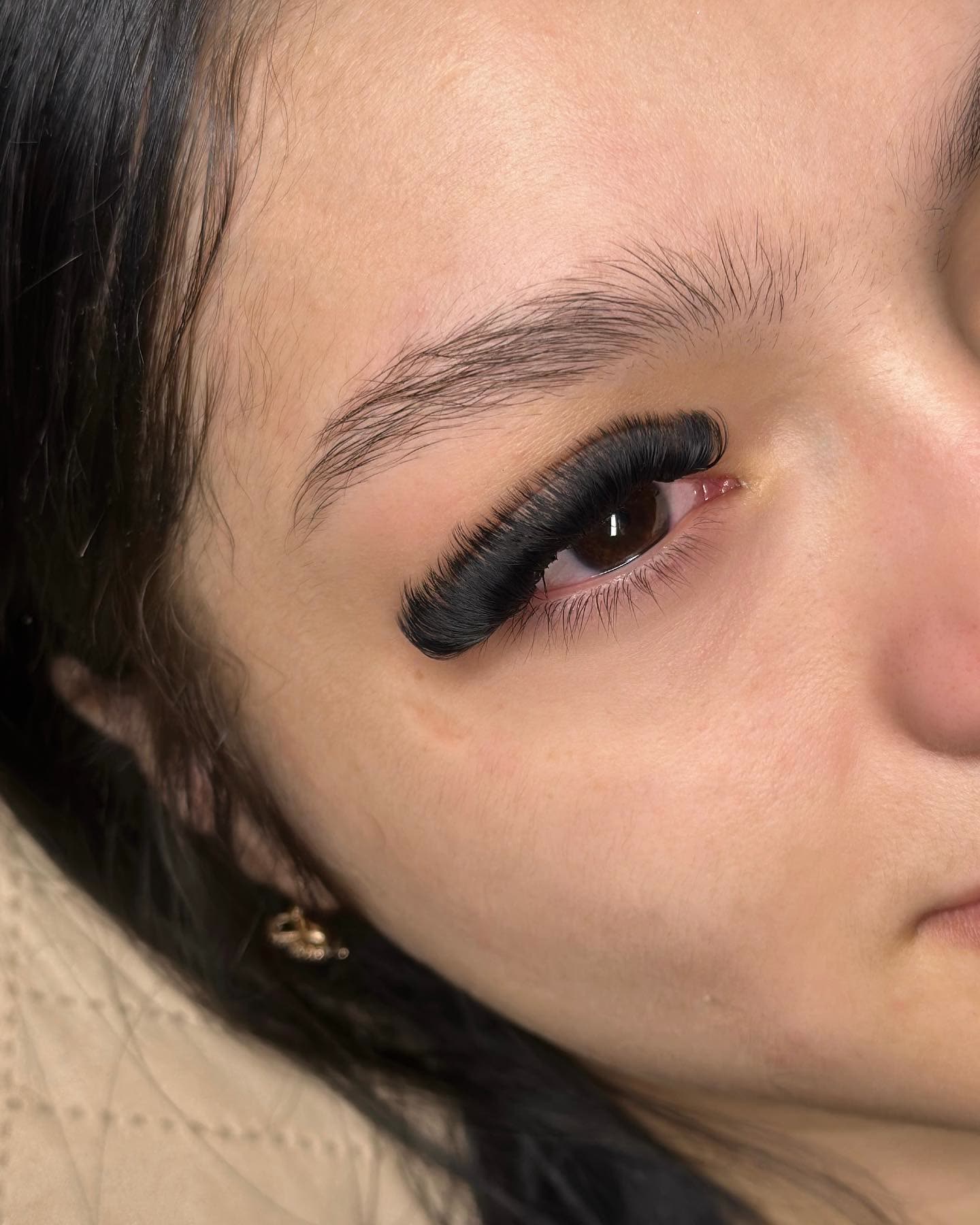 Dark volume set on a brown eye, close-up